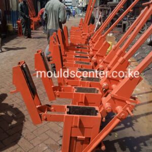 Interlocking brick machine